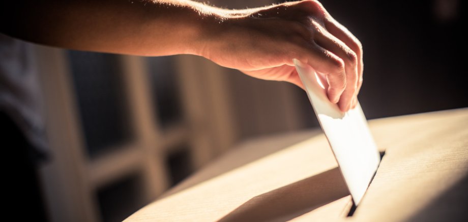 Conceptual image of a person voting during elections Conceptual image of a person voting during elections